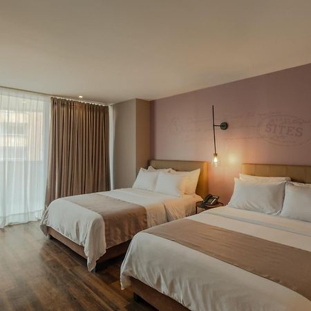 Sites Hotel Medellín Eksteriør billede A room at the hotel