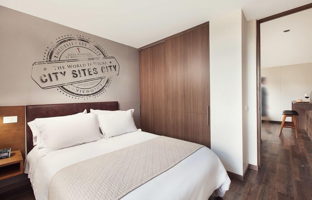Sites Hotel Medellín Eksteriør billede A bedroom in a typical apartment