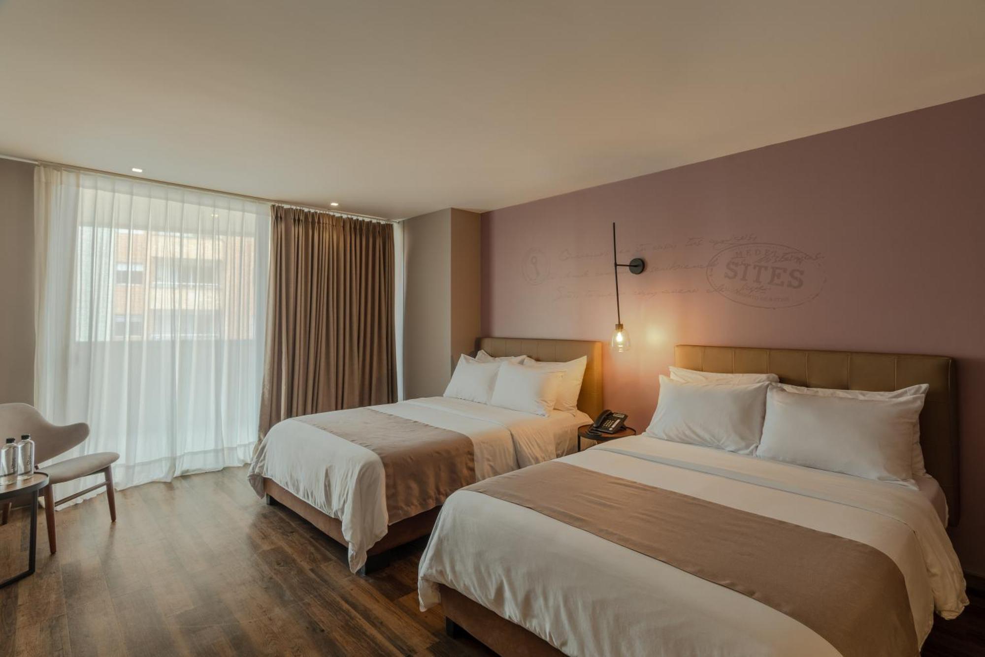 Sites Hotel Medellín Eksteriør billede A room at the hotel