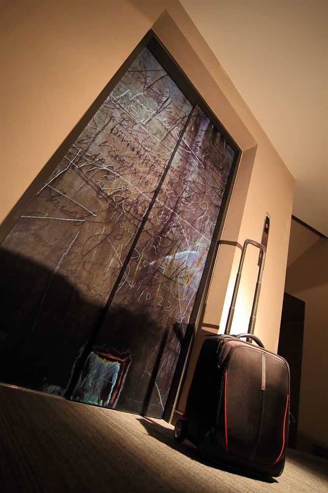 Sites Hotel Medellín Eksteriør billede Marble wall