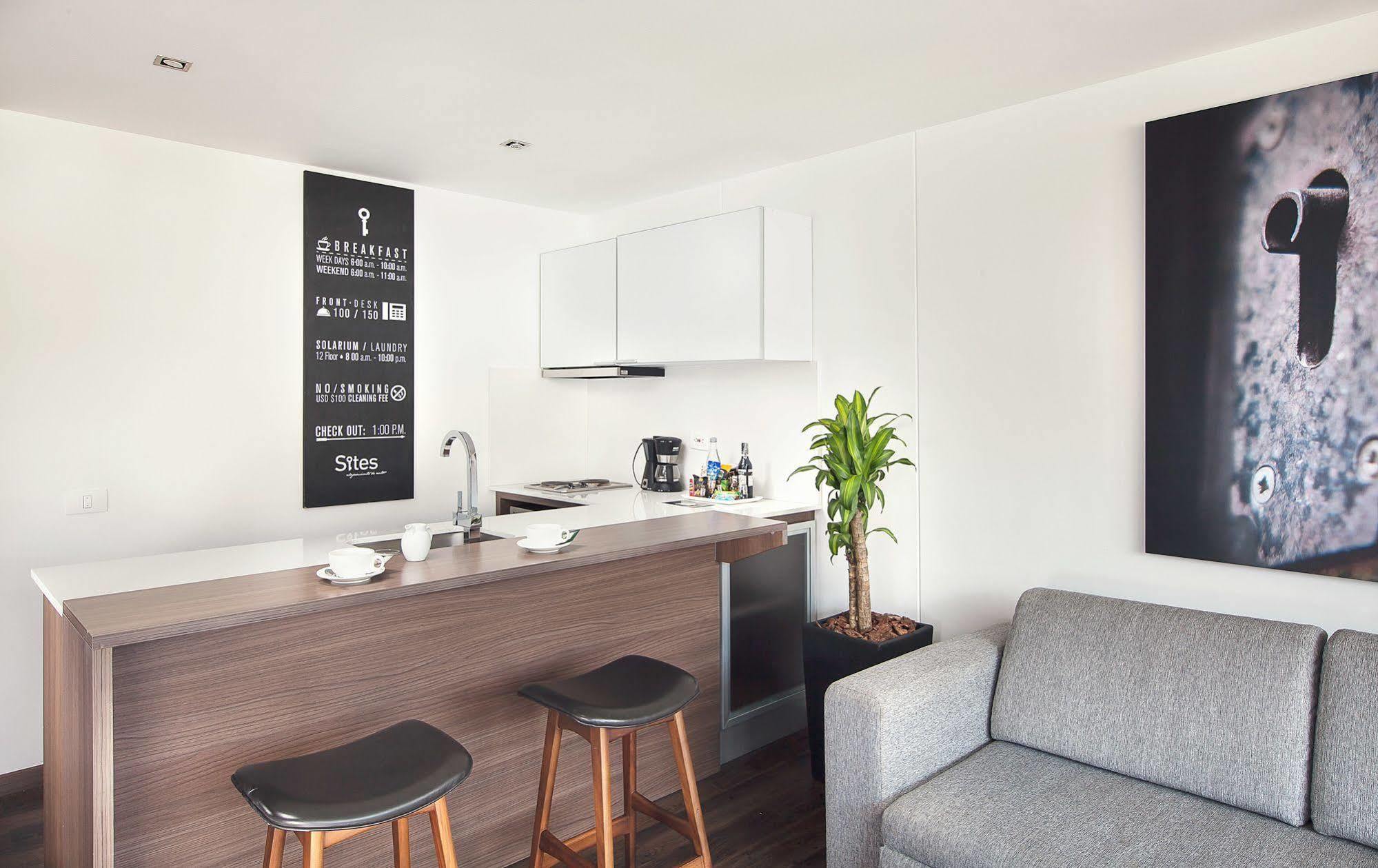 Sites Hotel Medellín Eksteriør billede A kitchen in a serviced apartment